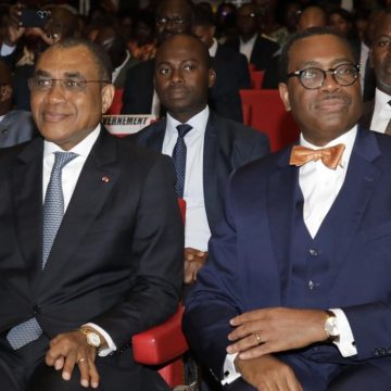 ph. coulibaly adama et adesina president bad bon bon Célébration des 60 ans de la BAD – Adama Coulibaly évoque les défis à relever par la Côte d’Ivoire